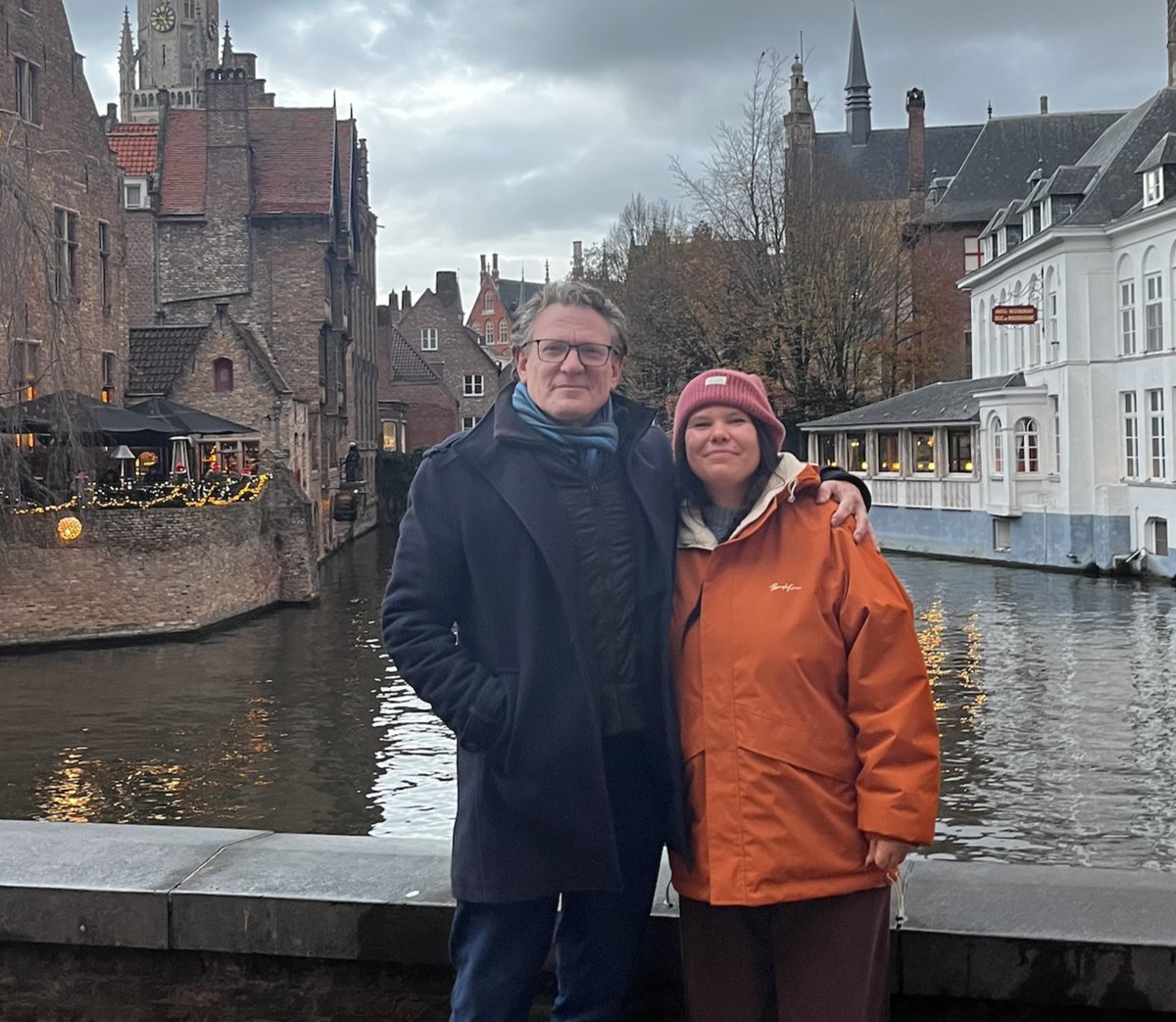 Bram De Vos and Anna Pogrebniak on a canal bridge in Bruges